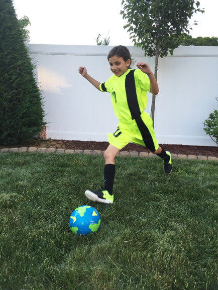 Jessica Reo playing soccer. Photograph courtesy Giovanni Roselli. 