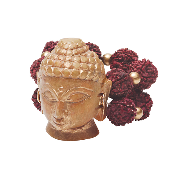 The Buddha Head napkin ring, in natural/gold, from Kim Seybert. Courtesy Kim Seybert.