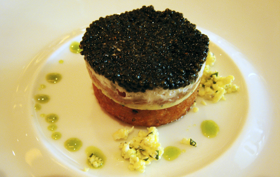 Ossetra caviar, salmon crème fraîche, potato shallot croquette, basil oil and egg whites and yolks. Photograph by Charles Haynes.