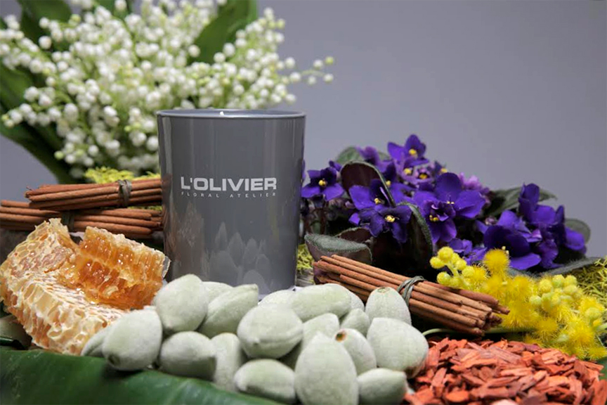 While the Mai Flower candle celebrates lily of the valley, its ingredients also include baby almonds, honey, mimosa and violet leaves. Courtesy L’Olivier.