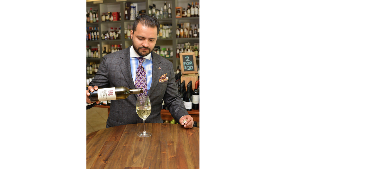 Luis Suarez samples Matanzas Creek Winery’s Sauvignon Blanc at Putnam & Vine in Greenwich. Photograph by Bob Rozycki.