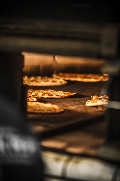 Delicious pizza in the making. Photograph courtesy Thomas McGovern Photography.