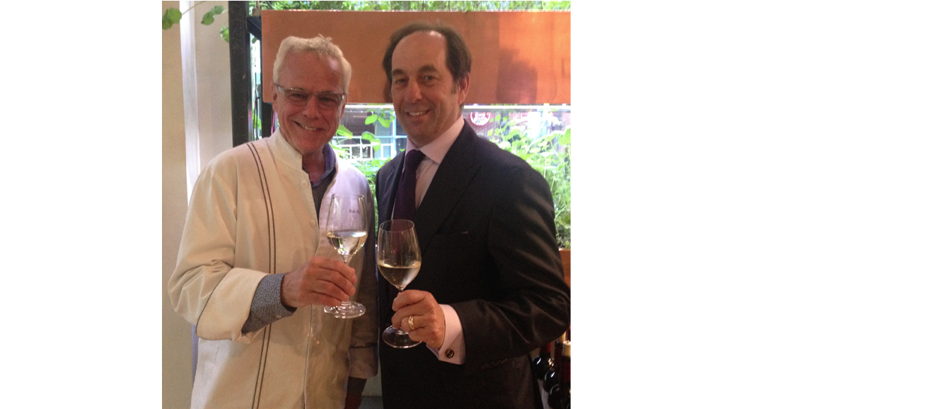 Chef and restaurateur David Bouley, left, toasts Joseph Carr, creator of Josh Cellars Wines, in Manhattan. Photograph by Doug Paulding.