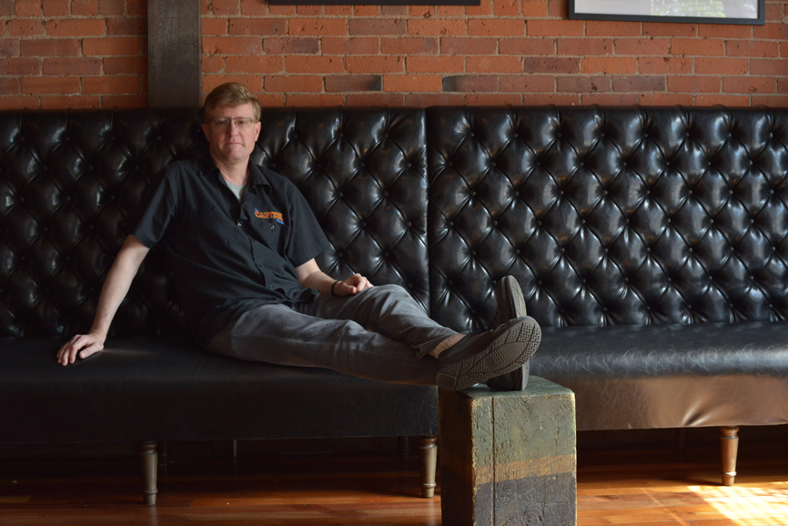 Tom Bailey, general manager of The Capitol Theatre, relaxes in Garcia’s. Photograph by Bob Rozycki.