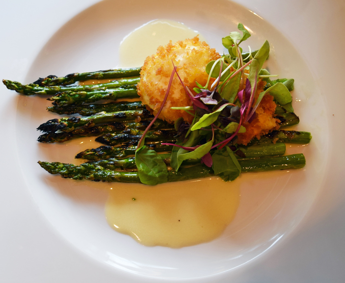 Grilled asparagus with a crisp poached egg. Photograph by Aleesia Forni.