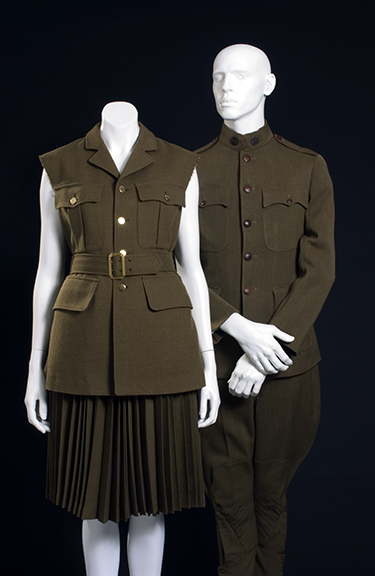 Comme des Garçons (Rei Kawakubo), left, ensemble, 1998, wool, Japan, museum purchase; and right, U.S. Army World War I Service Uniform, 1914-1918, wool, USA, Gift of Mrs. Roswell Gilpatric. Photograph © The Museum at FIT.