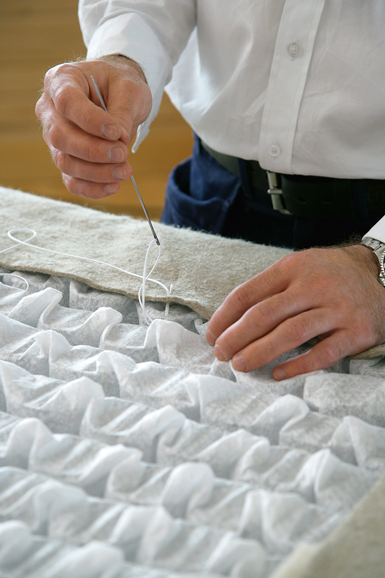 It’s a point of pride that every Hästens bed is crafted by hand. Photograph courtesy Hästens.