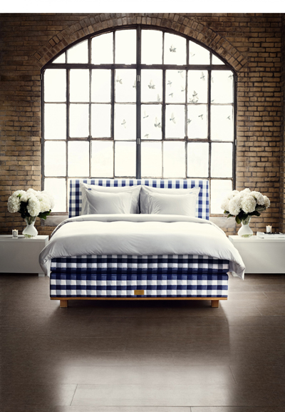 A Hästens bed is recognized by its trademark blue-and-white checkered pattern – and its handcrafted method of production. Photograph courtesy Hästens.