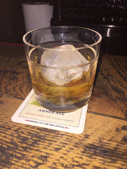 A glass of Four Roses Bourbon, one of the more than 150 types of brown spirits available at Buns-N-Bourbon.
