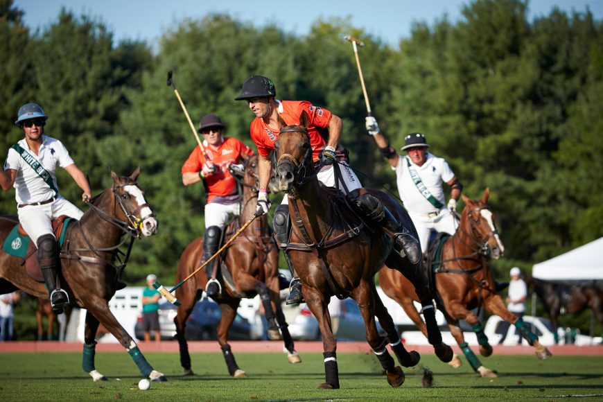 Nic Roldan of Audi – with teammate Marc Ganzi and White Birch’s Santino Magrini and Mariano Aguerre – controls the ball at the 2015 East Coast Open. Photograph by ChiChi Ubiña
