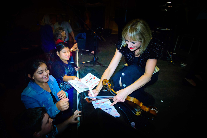 Jopling signs autographs for young fans. Photograph courtesy of Daisy Jopling.