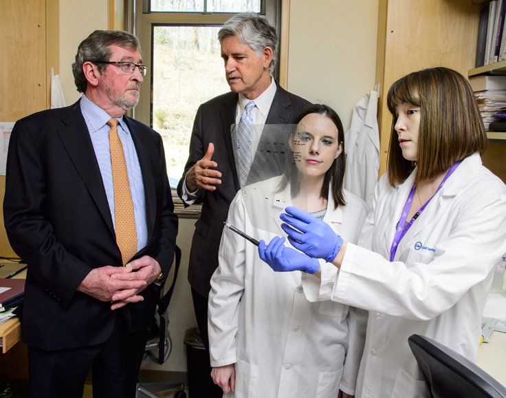 Northwell Health president and CEO Michael Dowling, left, during a visit to Cold Spring Harbor Laboratory. Courtesy Northwell Health.