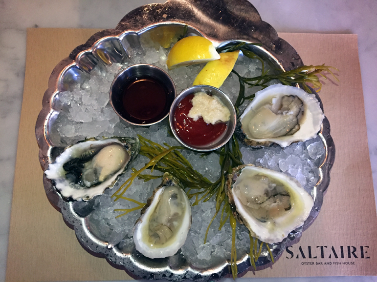 A sampling of oysters are served over ice with a house cocktail sauce and horseradish. Photograph by Aleesia Forni. 