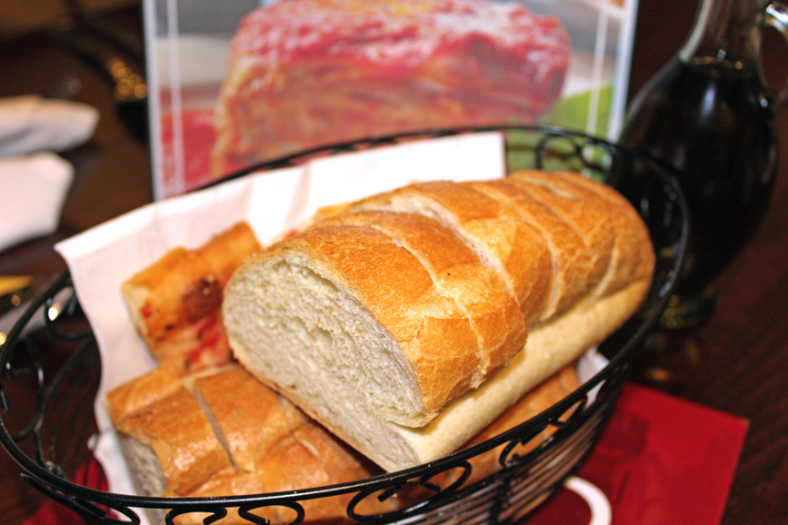 Upon seating, guests were offered bread, including focaccia, with bread and oil. Photograph by Aleesia Forni.