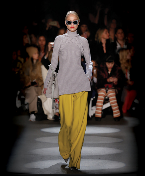 A a braided neck turtleneck and textured crepe wide-leg trouser. Photograph courtesy Christian Siriano.
