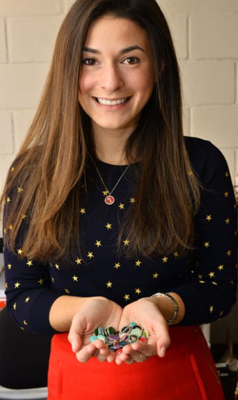 Samantha Levine, the founder and creative director of Auburn Jewelry, shows off some of her creations. Photograph by Bob Rozycki