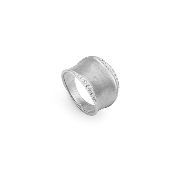 The new white diamond Lunaria ring hand-engraved in 18-karat white gold with pavé diamonds, $2,530. Photograph courtesy Marco Bicego.