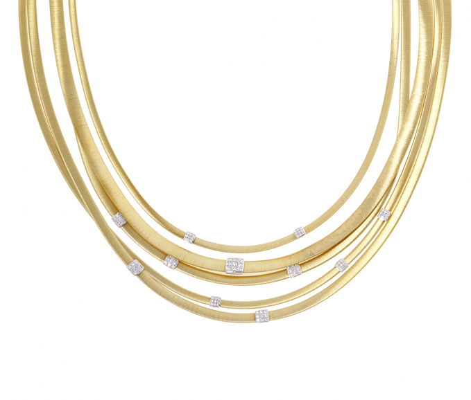 From Marco Bicego’s new Masai Collection – a necklace hand-coiled in 18-karat yellow gold with pave diamonds, $33,500. Photograph courtesy Marco Bicego.
