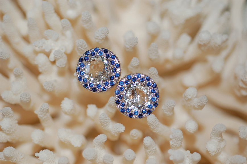 Diamond and blue sapphire earrings, featuring 1.30 carats of diamonds, 2.40 carats of sapphires and a 14mm topaz center.
Price available upon request. Photograph courtesy Isabel Dunay.