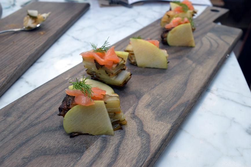 Yukon gold potato terrine, with acme smoked salmon, crème fraiche and Mutsu apple. Photograph by Aleesia Forni.