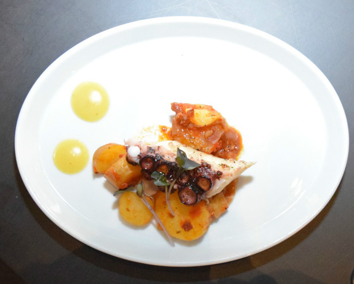Charred Spanish octopus with sliced potatoes, dried chorizo, sofrito and preserved lemon. Photograph by Aleesia Forni.