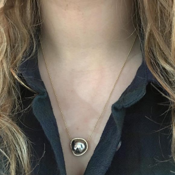 TahitianPearl:
This Tahitian pearl necklace at House of 29 Lifestyle Boutique by Sarah features a pearl set in yellow gold and surrounded by white diamonds. Photograph courtesy House of 29 Lifestyle Boutique by Sarah.
