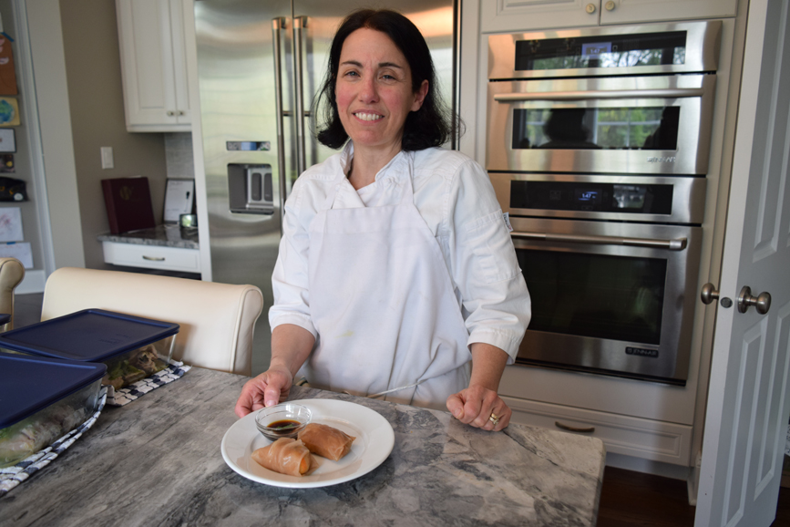 Laurie Gershgorn presents one of her many dishes prepared for a client. Photograph by Aleesia Forni.
