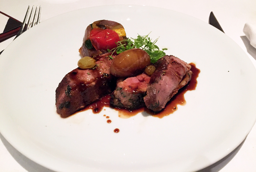 Expertly cooked duck breast is paired with vegetable caponata and drizzled with an aged balsamic vinegar. Photograph by Aleesia Forni.