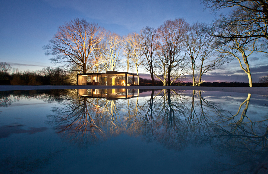 “Winter Dusk” offers an evocative view of The Glass House in New Canaan. Photograph © Robin Hill.