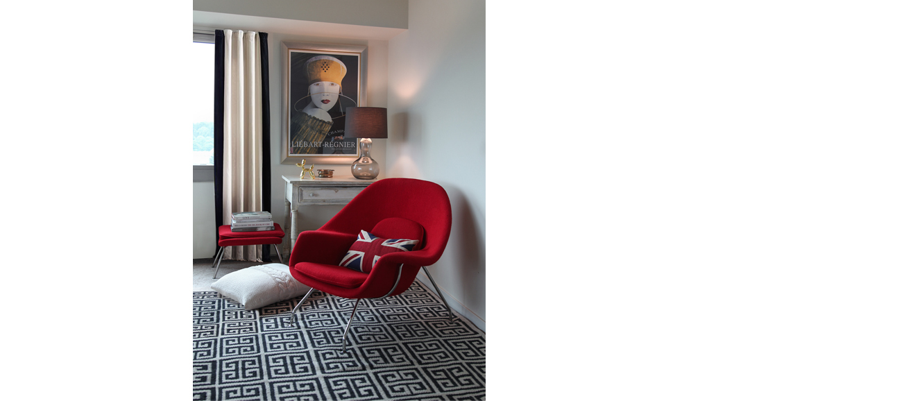 Classic (Greek key-pattern rug) meets modern (red chair) in this room, which adds a touch of the international (Union Jack pillow) for a personal, pulled-together, eclectic look. Courtesy Jane Morgan Interior Design.