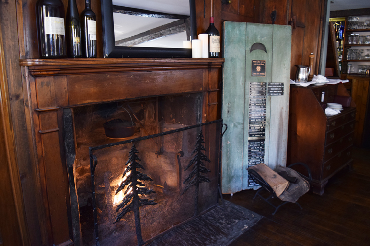 The restaurant features a cozy fireplace and vintage décor. Photograph by Aleesia Forni.