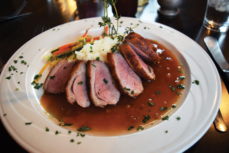 Juicy slices of well-seasoned duck breast are pan-roasted and served rare. Photograph by Aleesia Forni.
