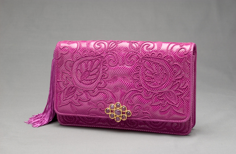 Fuchsia, embroidered karung envelope with amethyst lock and fuchsia tassel, 1973. Photograph by Gary Mamay. Courtesy the Leiber Collection.
