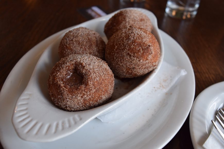 Who says you can’t have dessert for breakfast? This zeppole is stuffed with warm chocolate sauce and coated in cinnamon and sugar.