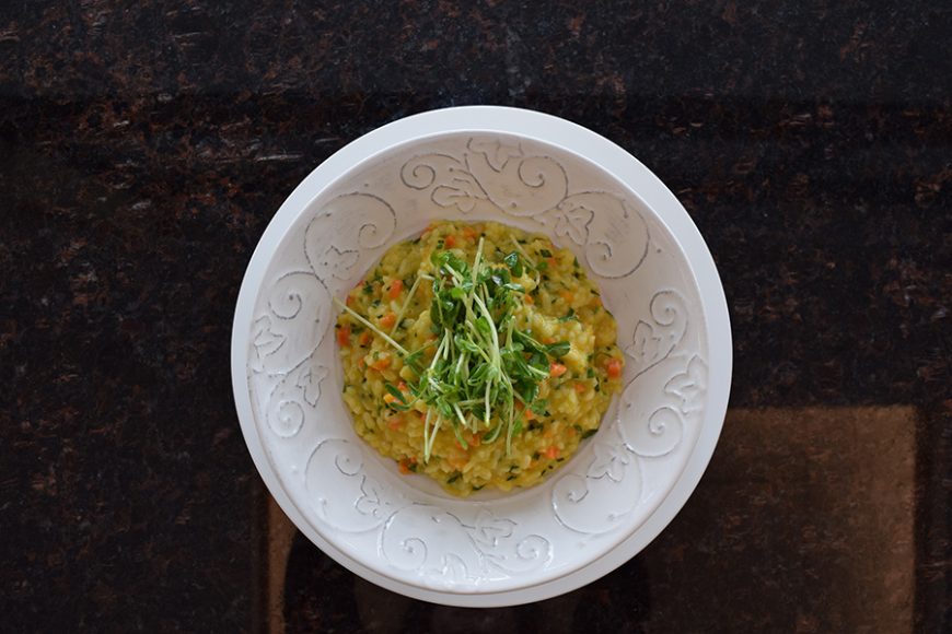 Carrot risotto is topped with sprouts and hints of citrus. Photograph by Aleesia Forni.