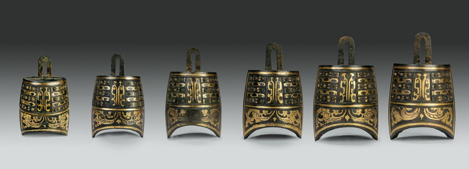 Six Niuzhong Balls from the Western Han dynasty (206 B.C.-A.D. 9), parcel-gilt bronze. Photograph courtesy Jiangxi Provincial Institute of Cultural Relics and Archaeology. 