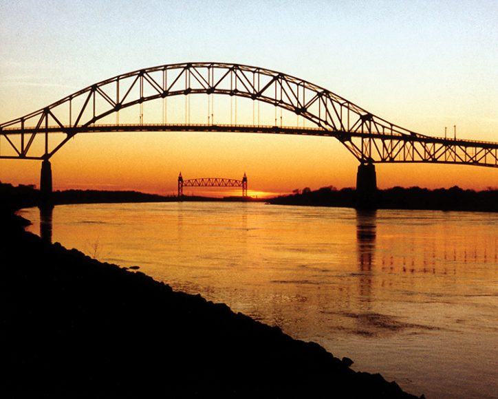 The Bourne Bridge over the Cape Cod Canal, with the Cape Cod Canal Railroad Bridge in the background. 