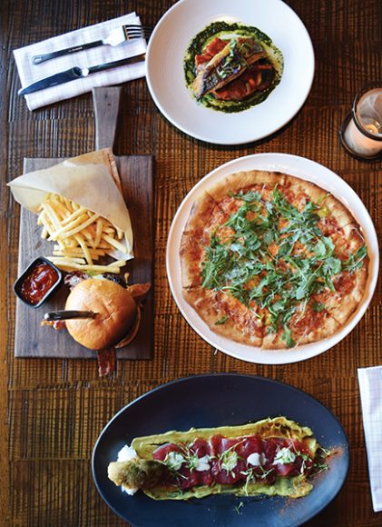 Menu options at City Perch include, clockwise from top, a juicy Perch Burger, a salami and arugula pizza and tuna crude. Photograph by Aleesia Forni.