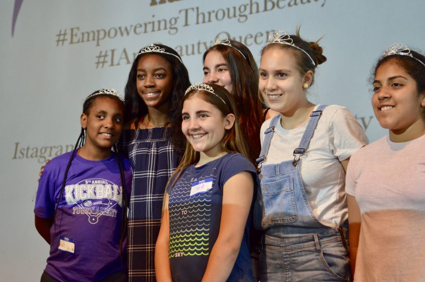 Symphony Akinloye, second from left, with sixth grade girls that were crowned. Photograph courtesy Empowering Through Beauty.