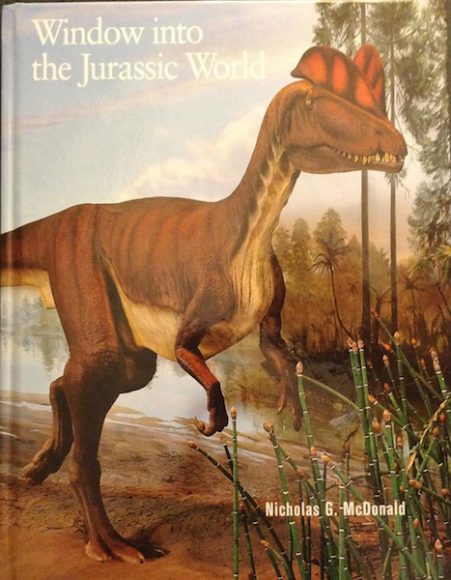 The cover of Nicholas G. McDonald’s “Window Into the Jurassic World.” Courtesy Bruce Museum