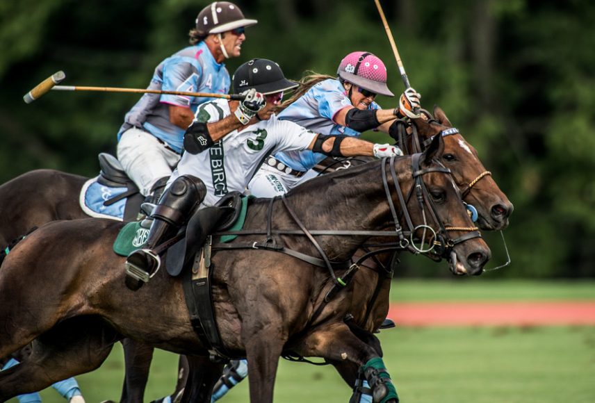 Mariano Aguerre, Maureen Brennan and Mariano Gonzalez in fierce action at Greenwich Polo Club. Photograph by Marcelo Bianchi.