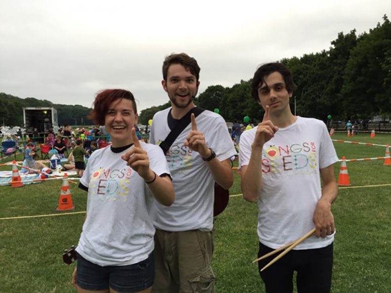 Songs for Seeds’ Terra Warman, Kit Benz and Kevin Kumar, from left, gathered at one of the group’s events.  Photograph courtesy Songs for Seeds.