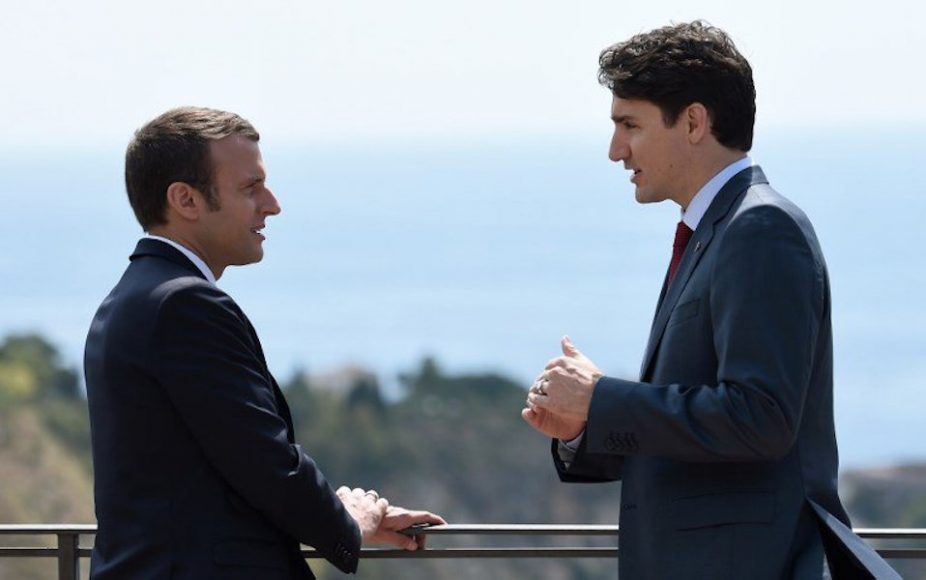 Emmanuel Macron. Justin Trudeau. A balcony. ’Nuff said.