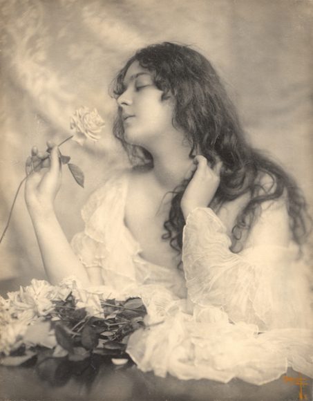 Rudolf Eickemeyer Jr., “Evelyn Nesbit with Rose,” 1901. Sepia print photo. Collection of the Hudson River Museum, Gift of Mrs. Erik Kaeyer, 75.29.49. This work is featured in “Floral Arrangements: Highlights from the Collection” at the Hudson River Museum in Yonkers.