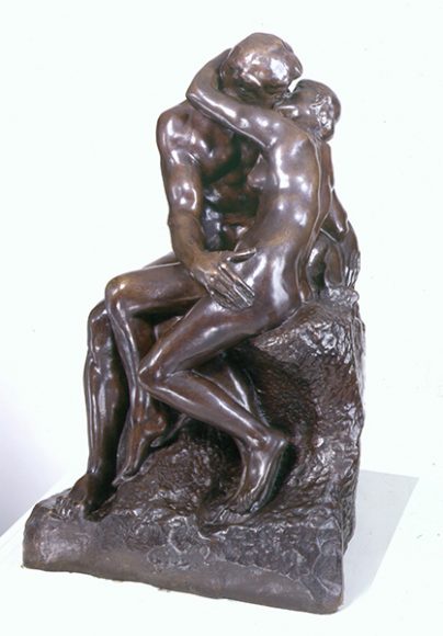 Auguste Rodin”s “The Kiss (Le Baiser)” (1886, conceived), bronze. Cast by Alexis Rudier. Courtesy Bruce Museum Collection. 