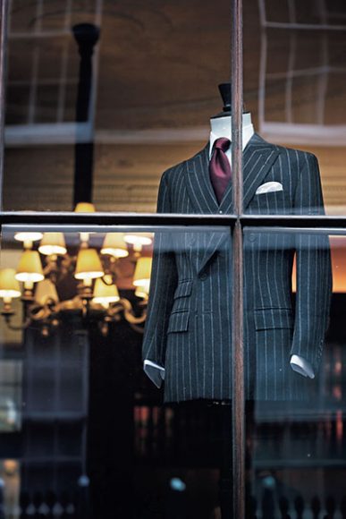 Crosshairs trained on the window of Anderson & Sheppard, one of several distinguished tailors in the area to have dressed men of distinction for over a hundred years. Munster/The Rake/2008. Image from "Bespoke: The Masters Tailors of Savile Row" (Thames & Hudson.)