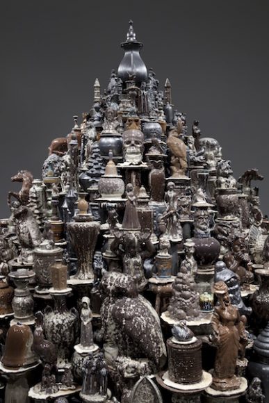 Walter McConnell, Dark Stupa (detail), 2008. Cast porcelain from salvaged hobby industrial molds, zinc crystalline glaze, sand and plywood shelving. Courtesy the artist and Cross-McKenzie Gallery, Washington, D.C.
