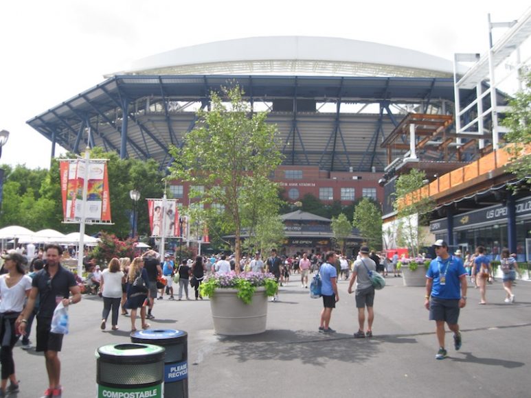 Arthur Ashe Stadium dominates the main plaza.
