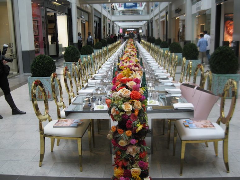 Sherbet-colored autumnal roses were among the stars of the centerpieces by KC Creations that made a stunning garland on the banquet table.