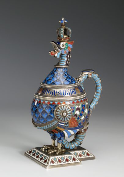 Wine carafe in the form of a griffin, Ivan Khlebnikov (Russian, 1819-1881), Moscow, 1874, Silver gilt, champlevé enamel, 8 ½ x 4 ⅞ x 3 ½ in. (21.6 x 12.2 x 9 cm), Provenance: Jean M. Riddell; The Walters Art Museum, 2010, gift in memory of Jean M. Riddell, 44.790, Cat. no. 30, © The Walters Art Museum. Photography by Susan Tobin. Courtesy Thames & Hudson.